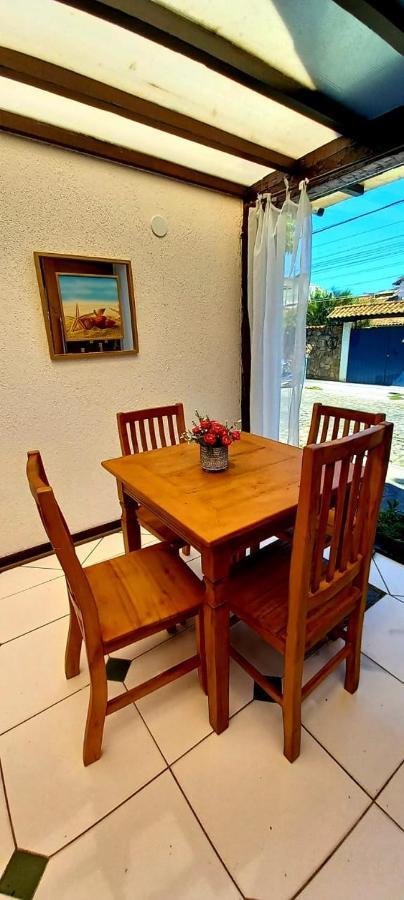 Bliss Hoteis Centro Búzios エクステリア 写真 A dining room table with four chairs