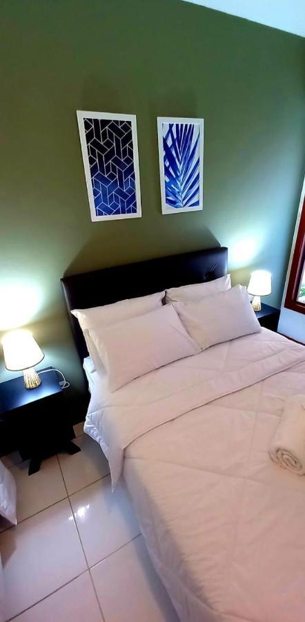 Bliss Hoteis Centro Búzios エクステリア 写真 A bed with two pillows