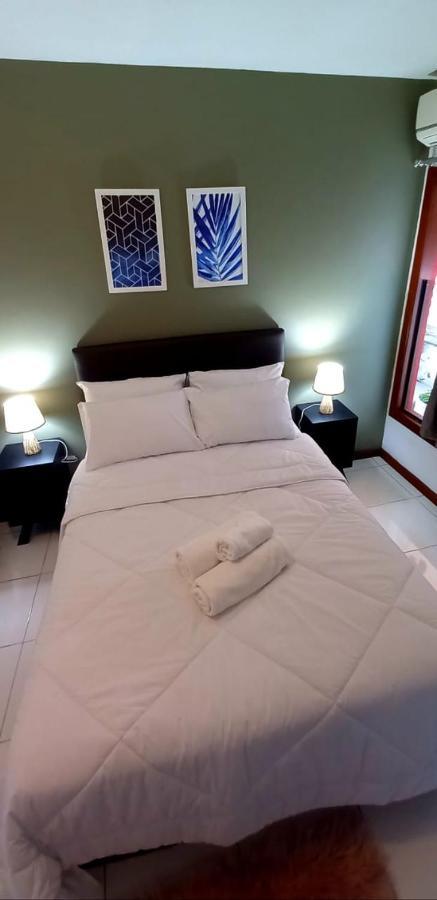 Bliss Hoteis Centro Búzios エクステリア 写真 A bed with a duvet